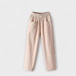Linen trousers in beige with elastic waistband and side patch pockets