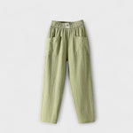 Linen trousers in light green with elastic waistband and side patch pockets