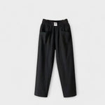 Linen trousers in black with elastic waistband and side patch pockets