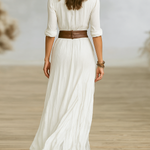 White long linen dress back view with reverse collar, gathered waist and pleated skirt.