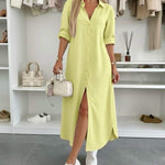 Oversized shirt dress in light lime green, button-front, short sleeves, side slit hem