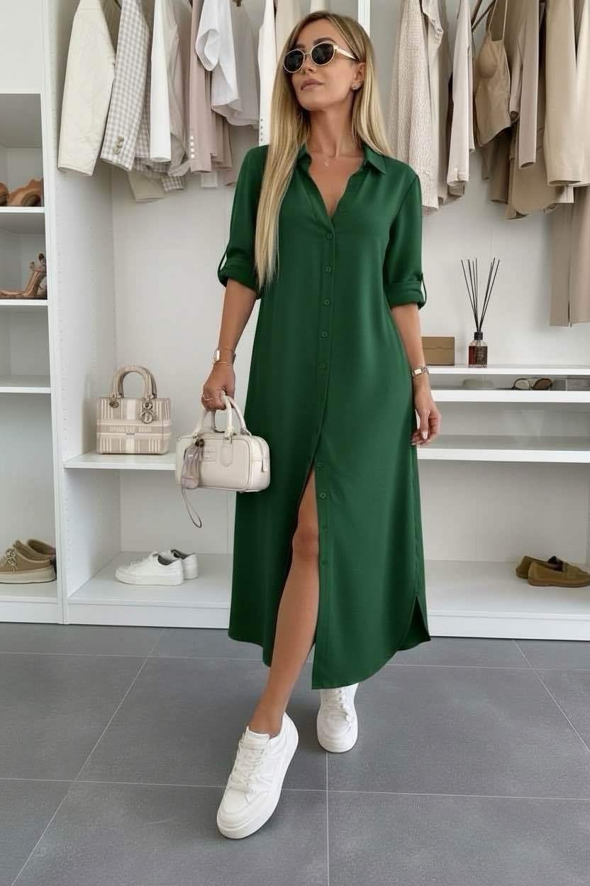 Oversized shirt dress in deep green, short sleeves, V-neck, front button placket, slit