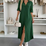 Oversized shirt dress in deep green, short sleeves, V-neck, front button placket, slit