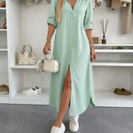 Oversized shirt dress in light mint, short sleeves, V-neck, front button placket, slit