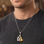 Cat hug pendant necklace with silver chain and gold-tone heart-shaped charm