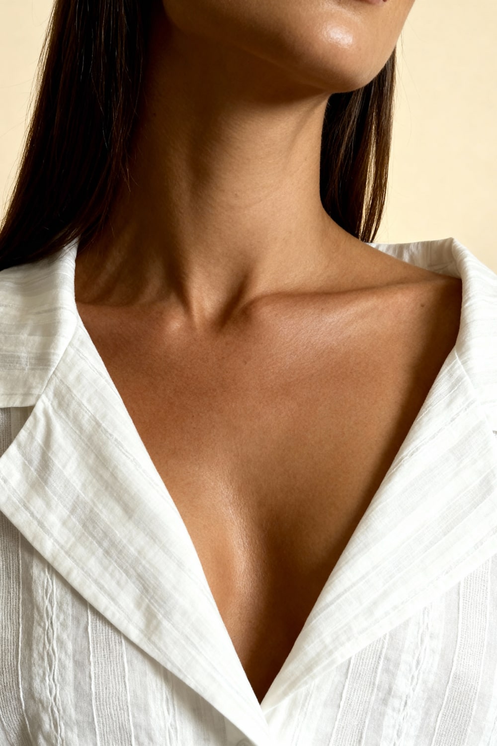 White pajama top with V-neck placket and soft collar detailing