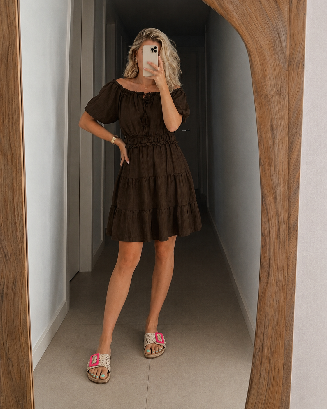 Dark brown off-shoulder tiered dress with short puff sleeves and smocked waist