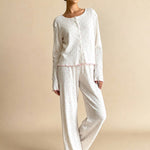 Noma pajama set in white with pink hearts, long-sleeve top and elastic-waist pants
