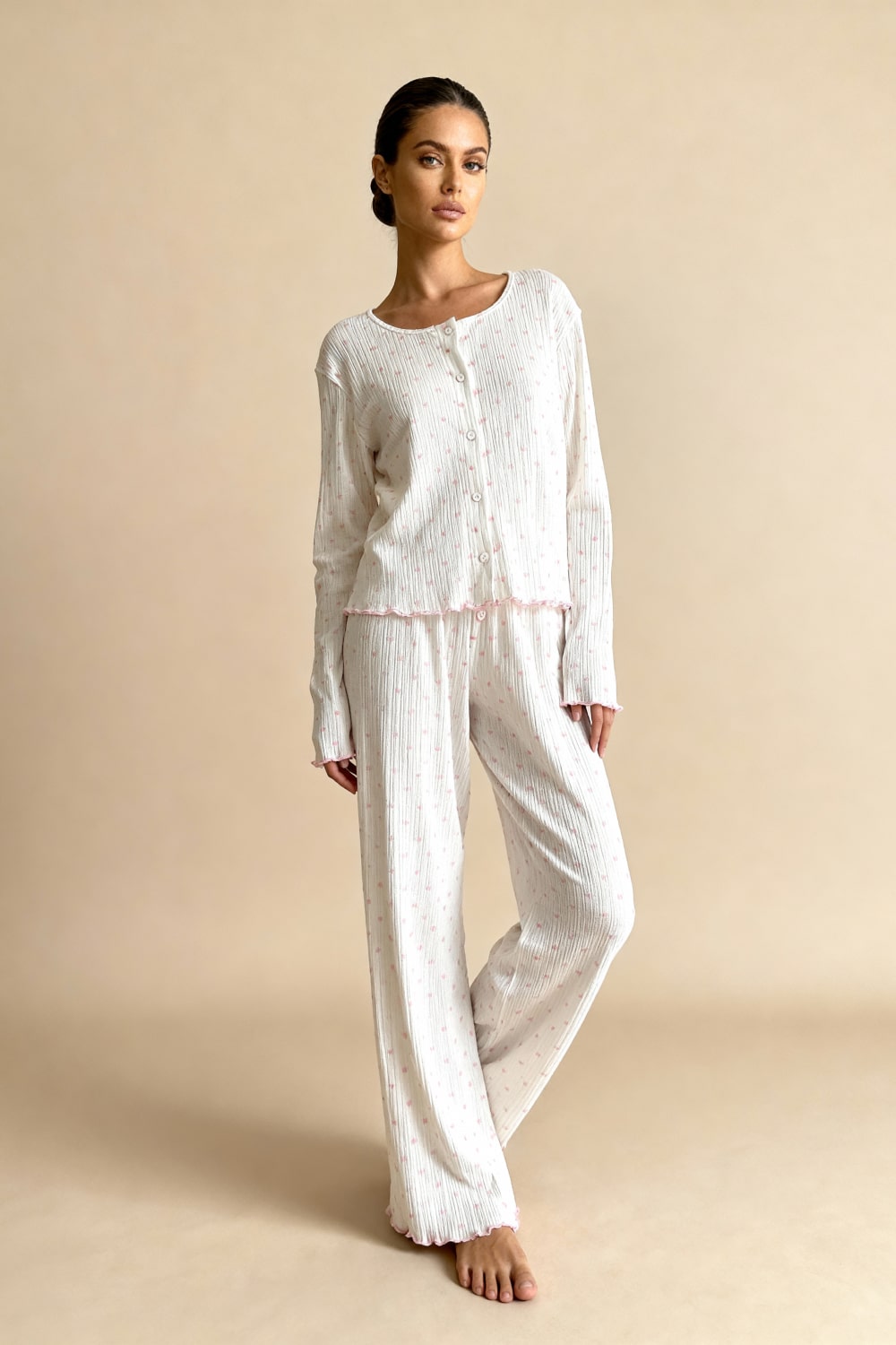 Noma pajama set in white with pink hearts, long-sleeve top and elastic-waist pants