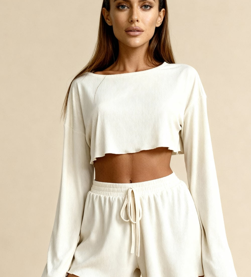 Women's off-white pajama set with cropped long-sleeve top and drawstring shorts
