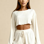 Women's off-white pajama set with cropped long-sleeve top and drawstring shorts