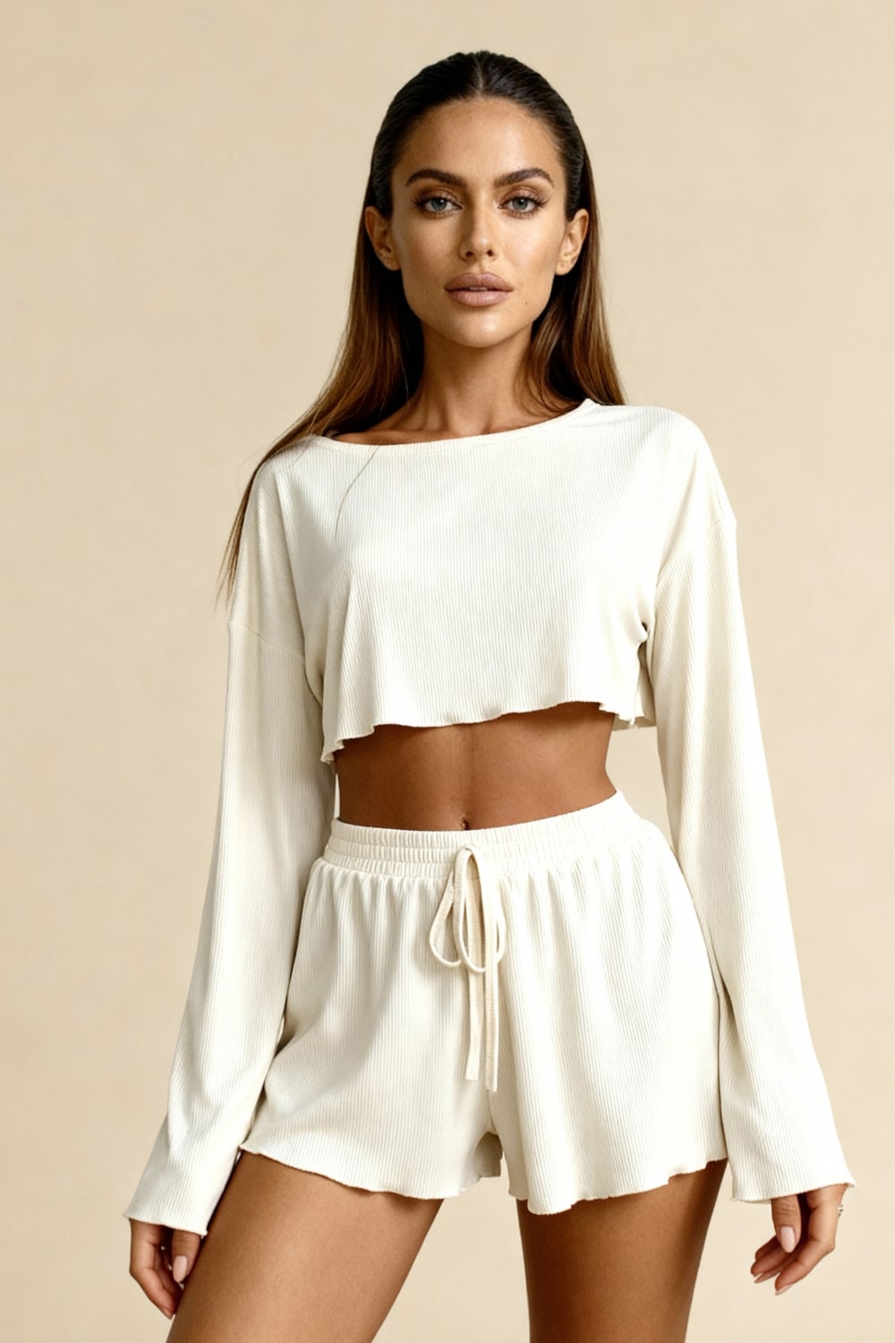 Women's off-white pajama set with cropped long-sleeve top and drawstring shorts