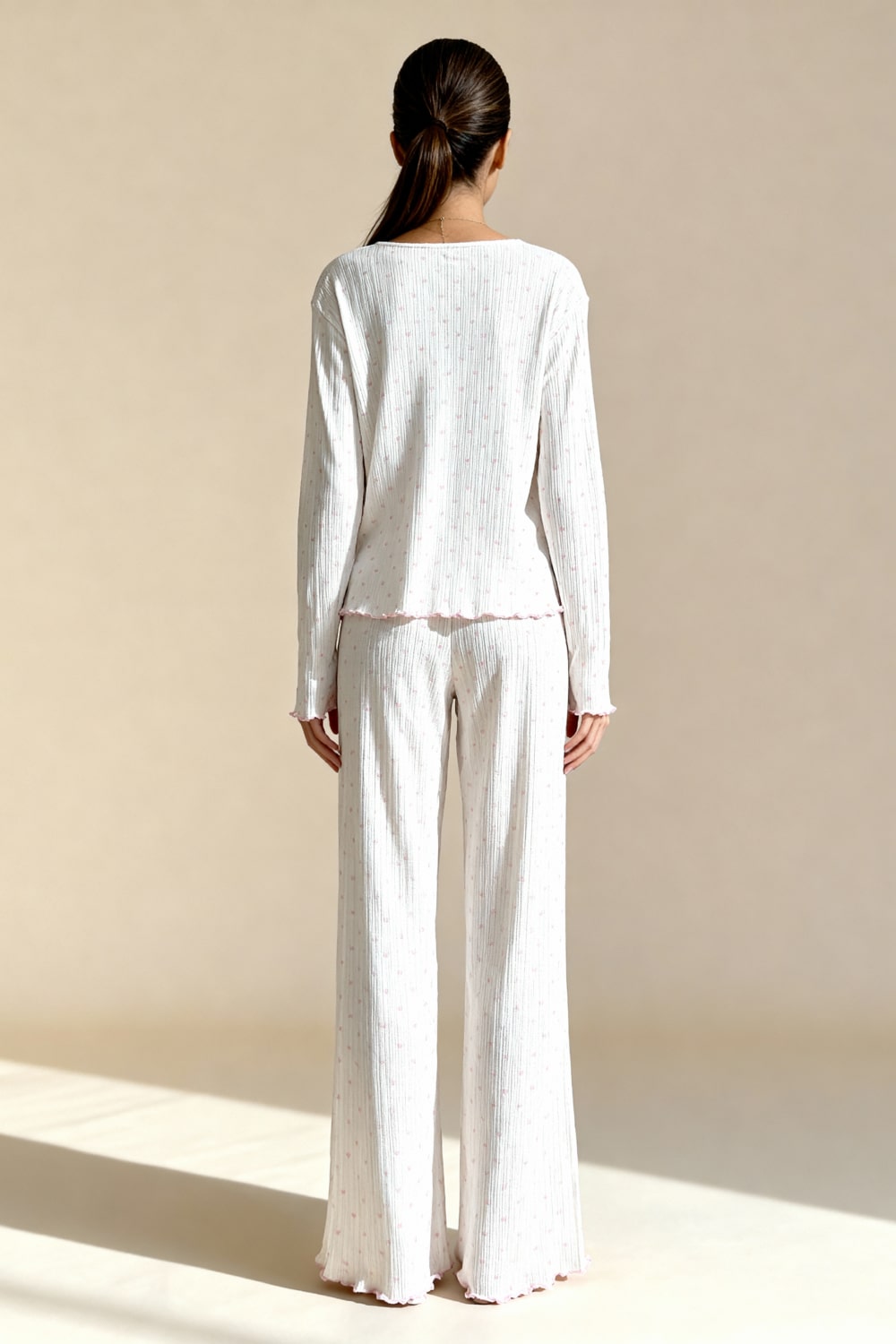 Noma pajama set, back view with heart print, long sleeves and elastic-waist pants