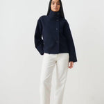 Cropped dark navy jacket with stand collar and button-up front