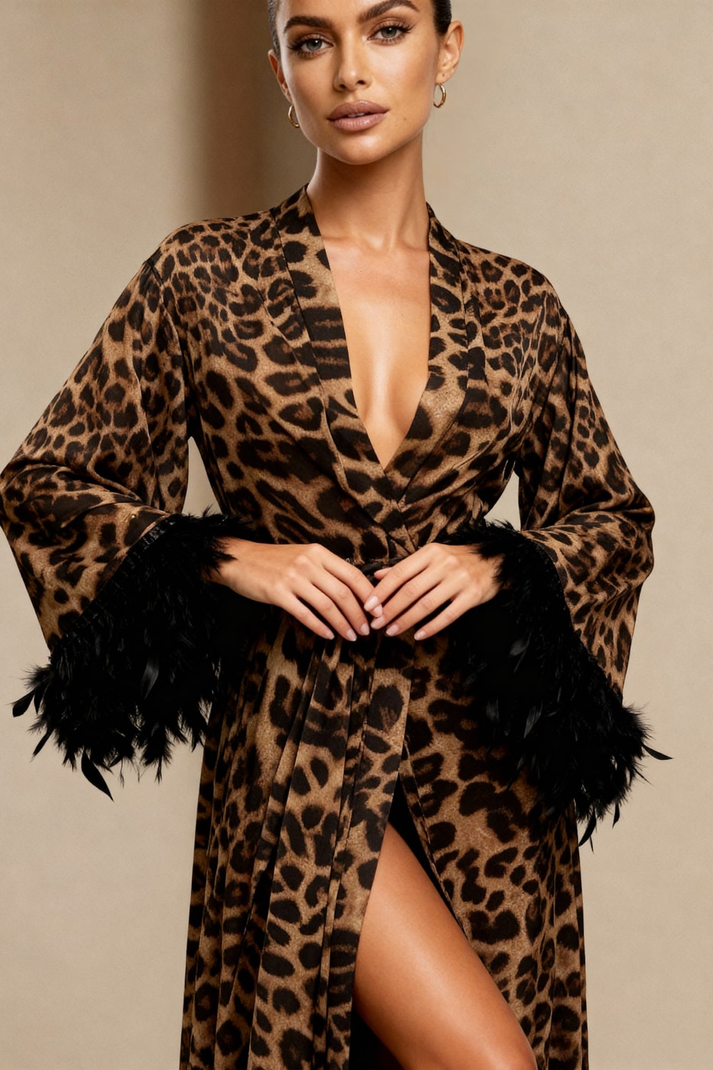 Leopard print kimono robe with V-neck, tied waist, and black faux feather cuff trim