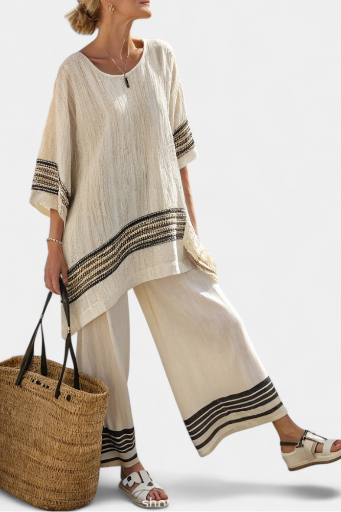 Women’s beige tunic top with black striped trim and wide-leg pants set