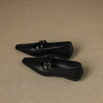 Ceyla black Mary Jane flats with double straps and perforated toe, side view