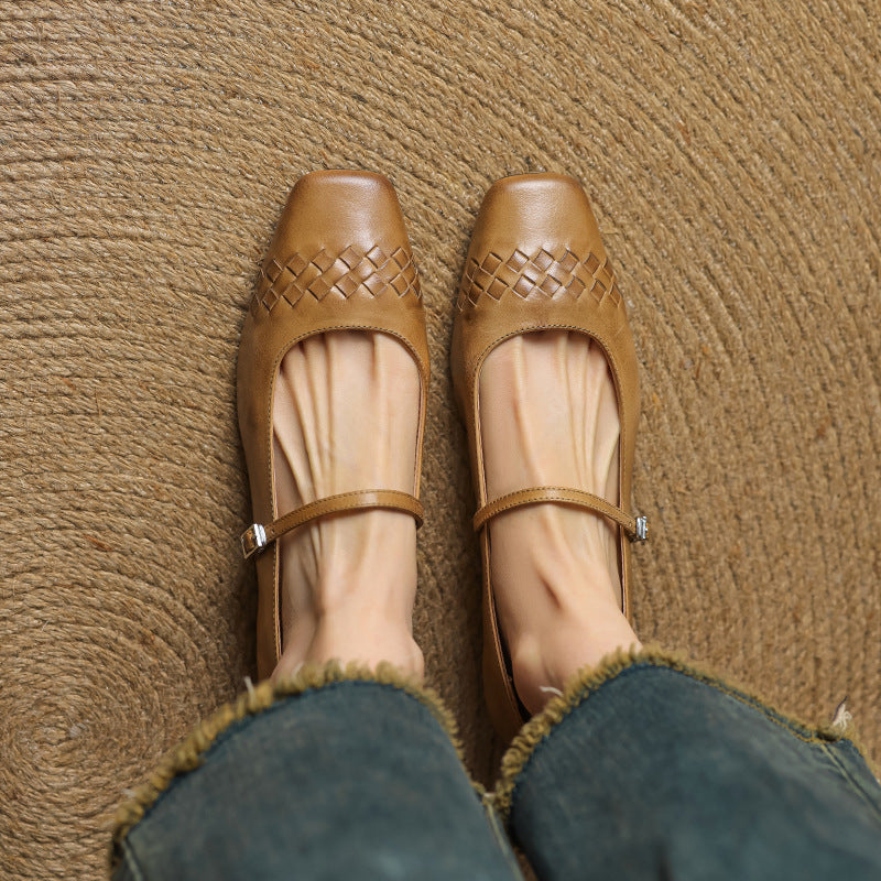 Pair of tan Mary Jane flats with square toe and woven lattice upper, ankle strap