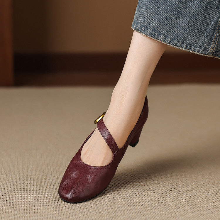 Burgundy round-toe Mary Jane pumps with buckled strap and low block heel