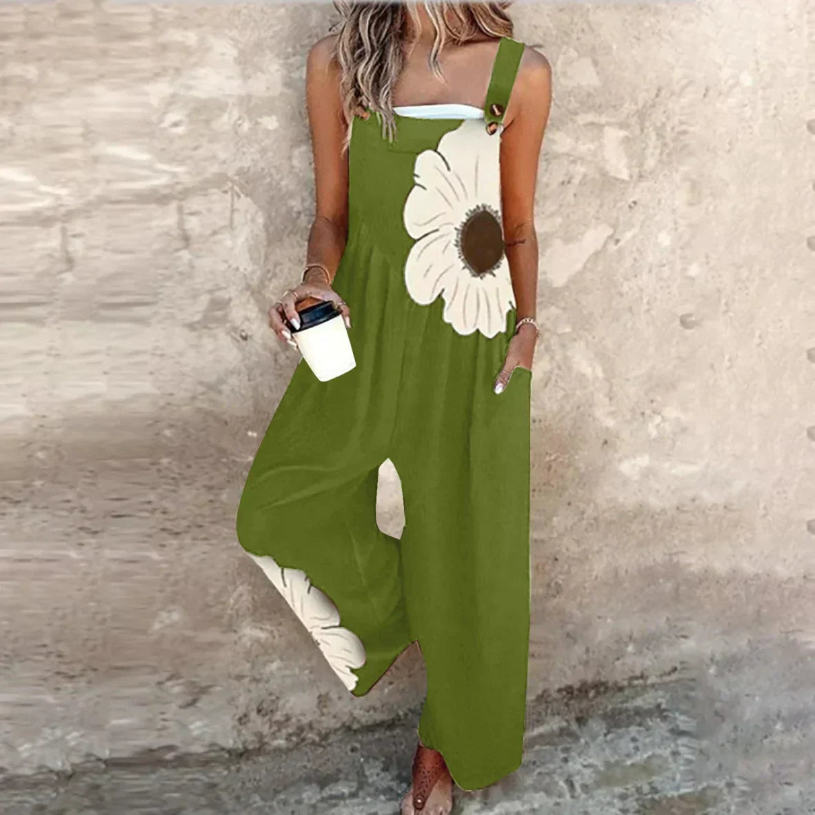 Loose printed overalls, sleeveless olive green with large white daisy floral front, wide legs