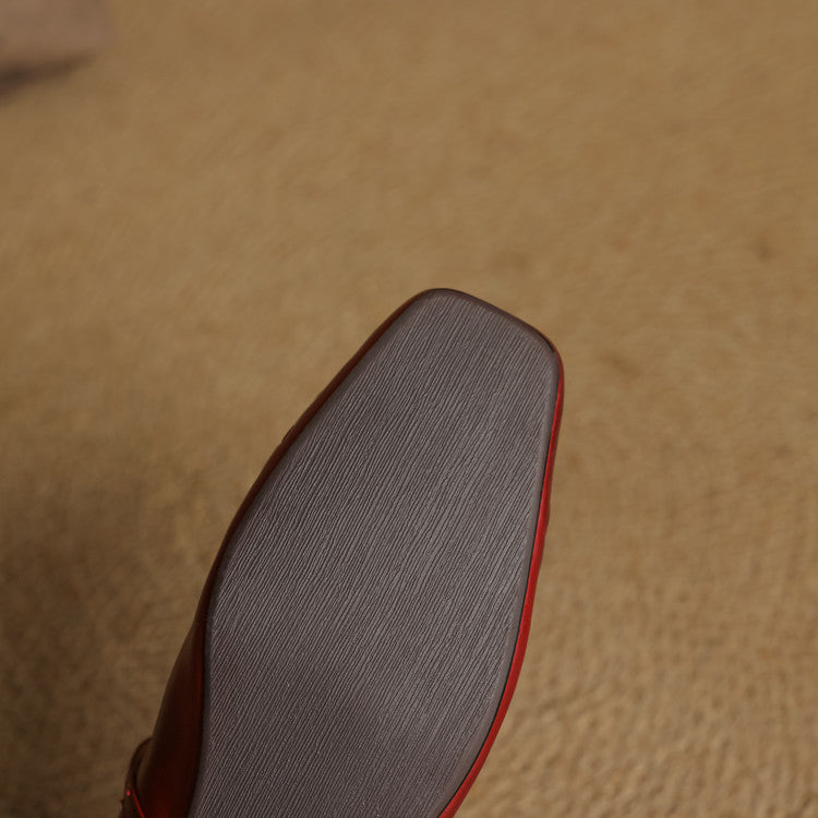 Red Mary Jane flat sole view, low profile with rounded square toe.