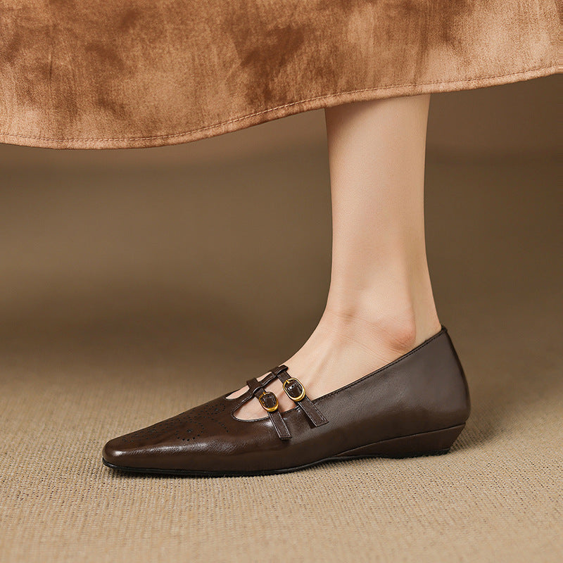 Brown Mary Jane wedge flats with two buckle straps and perforated toe