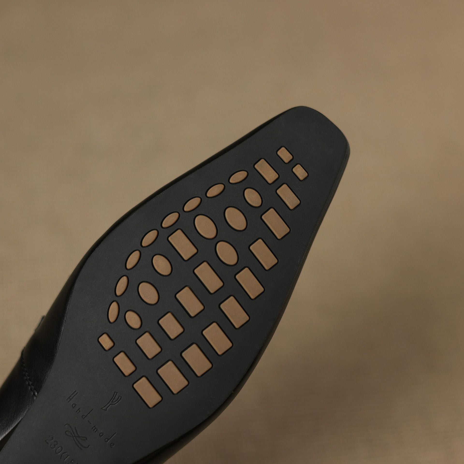 Ceyla black outsole bottom view with patterned grip texture