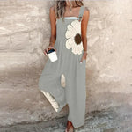Loose printed overalls, sleeveless light gray with large white daisy floral front, wide legs