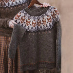 Knit pullover sweater with fair isle yoke, crew neck, long sleeves, dark gray.