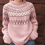 Pink knit pullover sweater with fair isle pattern, ribbed crew neck and cuffs