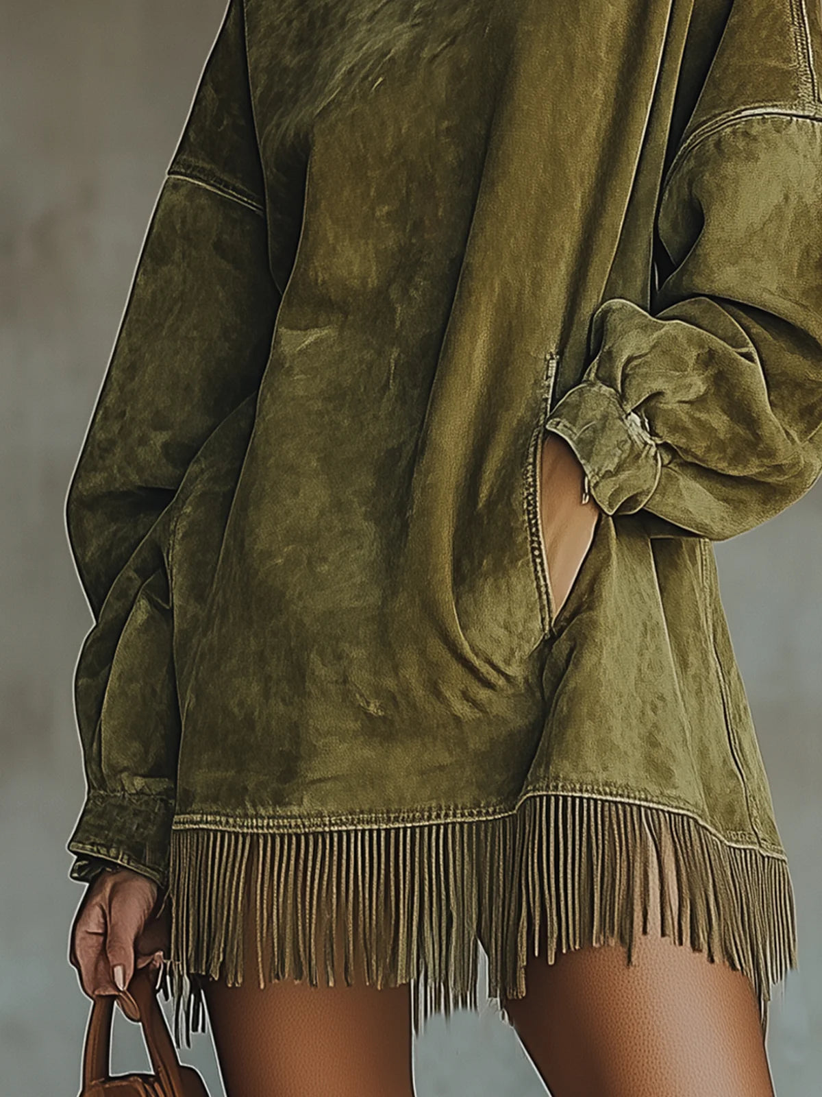 Suede shift dress detail with fringe hem and long sleeves; olive green
