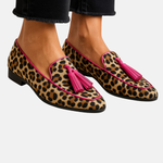 Leopard moccasin shoes with magenta tassel trim, pink piping, low-profile sole