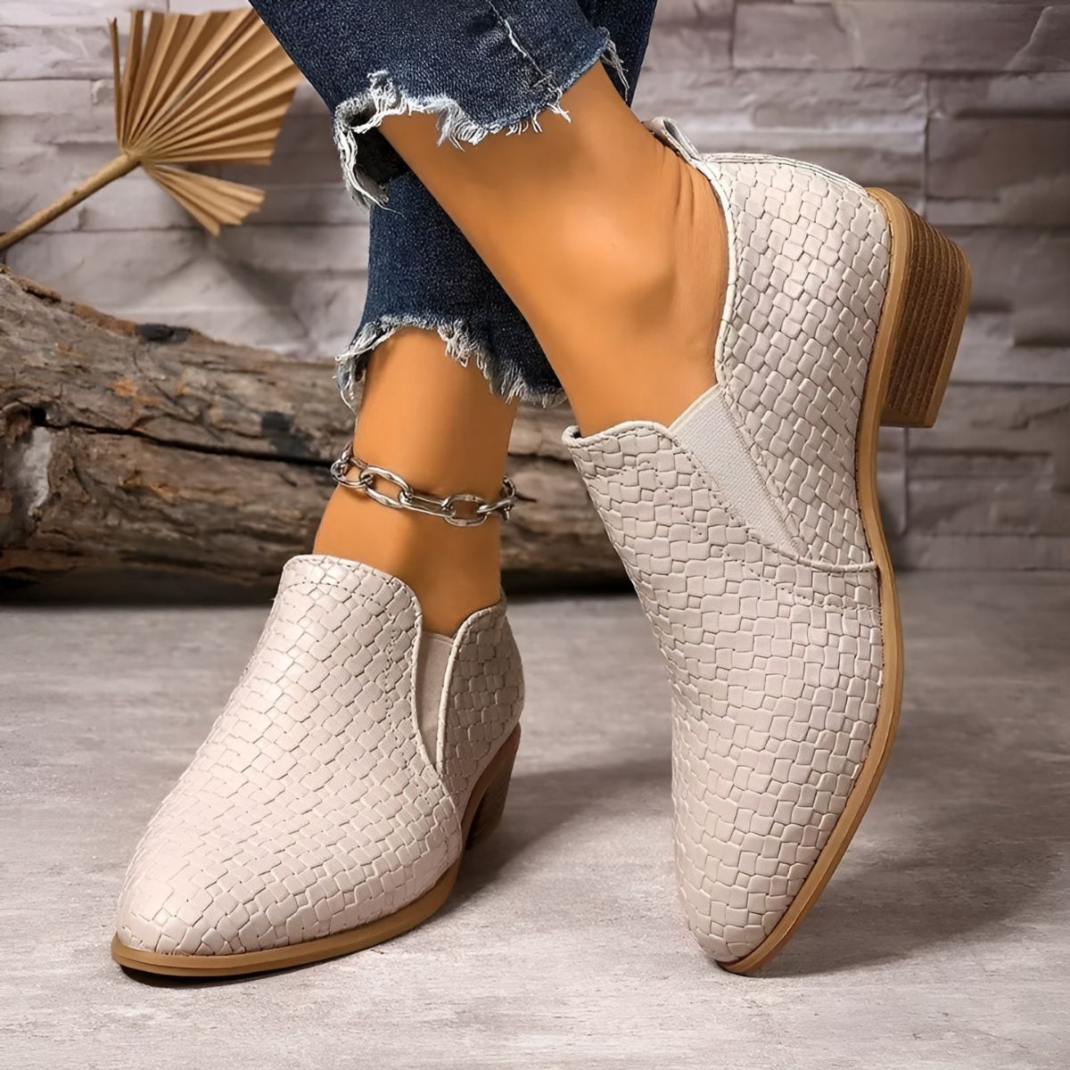 Light gray textured ankle boots with chain strap and block heel