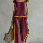 Dark blue linen two-piece set with square neckline and matching wide-leg pants