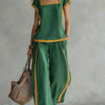 Green linen two-piece set with square neckline and matching wide-leg pants