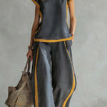 Black linen two-piece set with square neckline and matching wide-leg pants