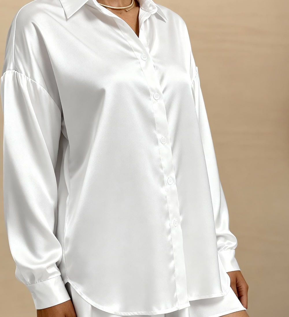 White button-up pajama blouse with point collar, long sleeves, slightly flared hem
