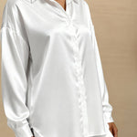 White button-up pajama blouse with point collar, long sleeves, slightly flared hem