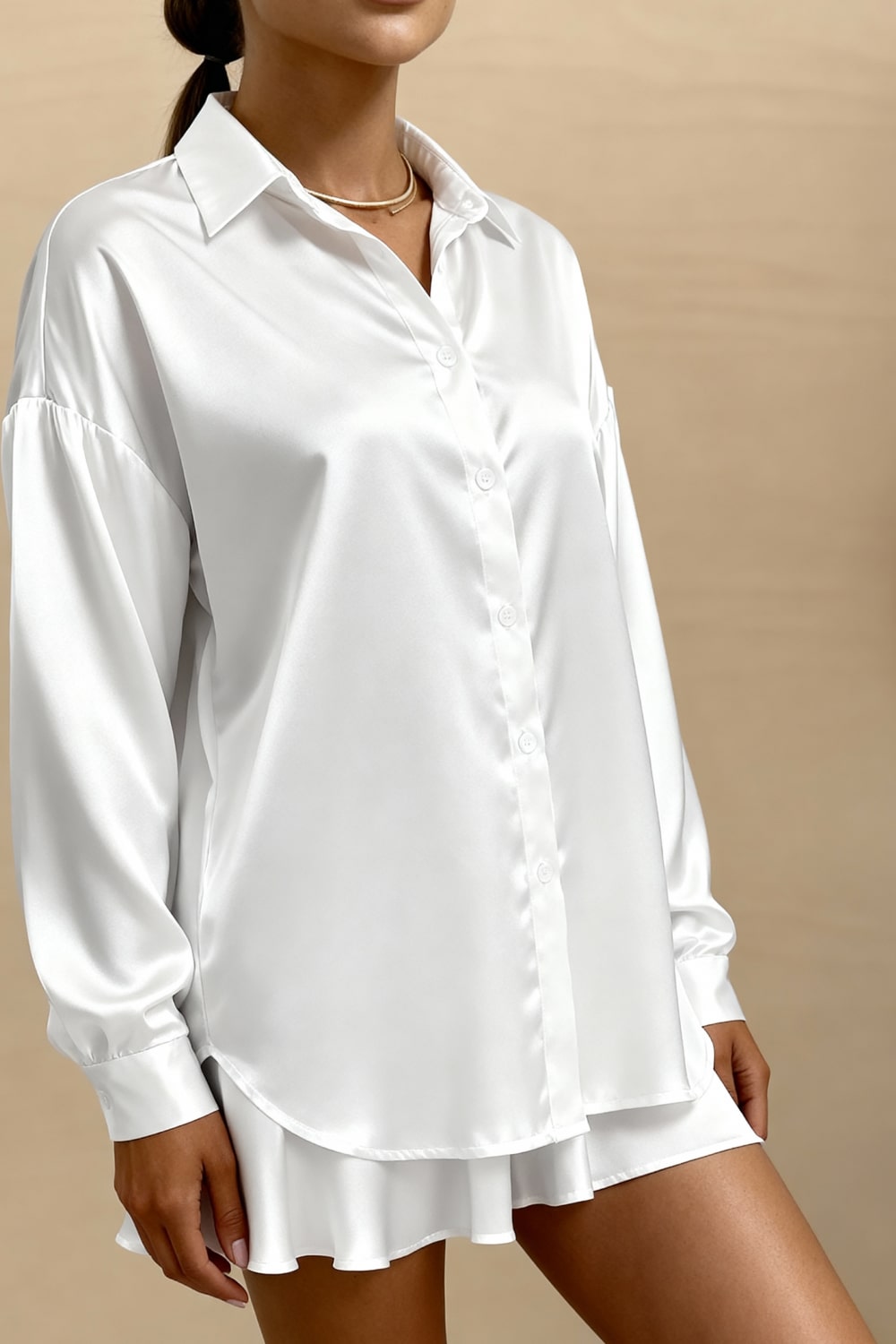 White button-up pajama blouse with point collar, long sleeves, slightly flared hem
