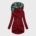 Red winter parka with hood, full zipper, side pockets, and teal-pattern hood lining