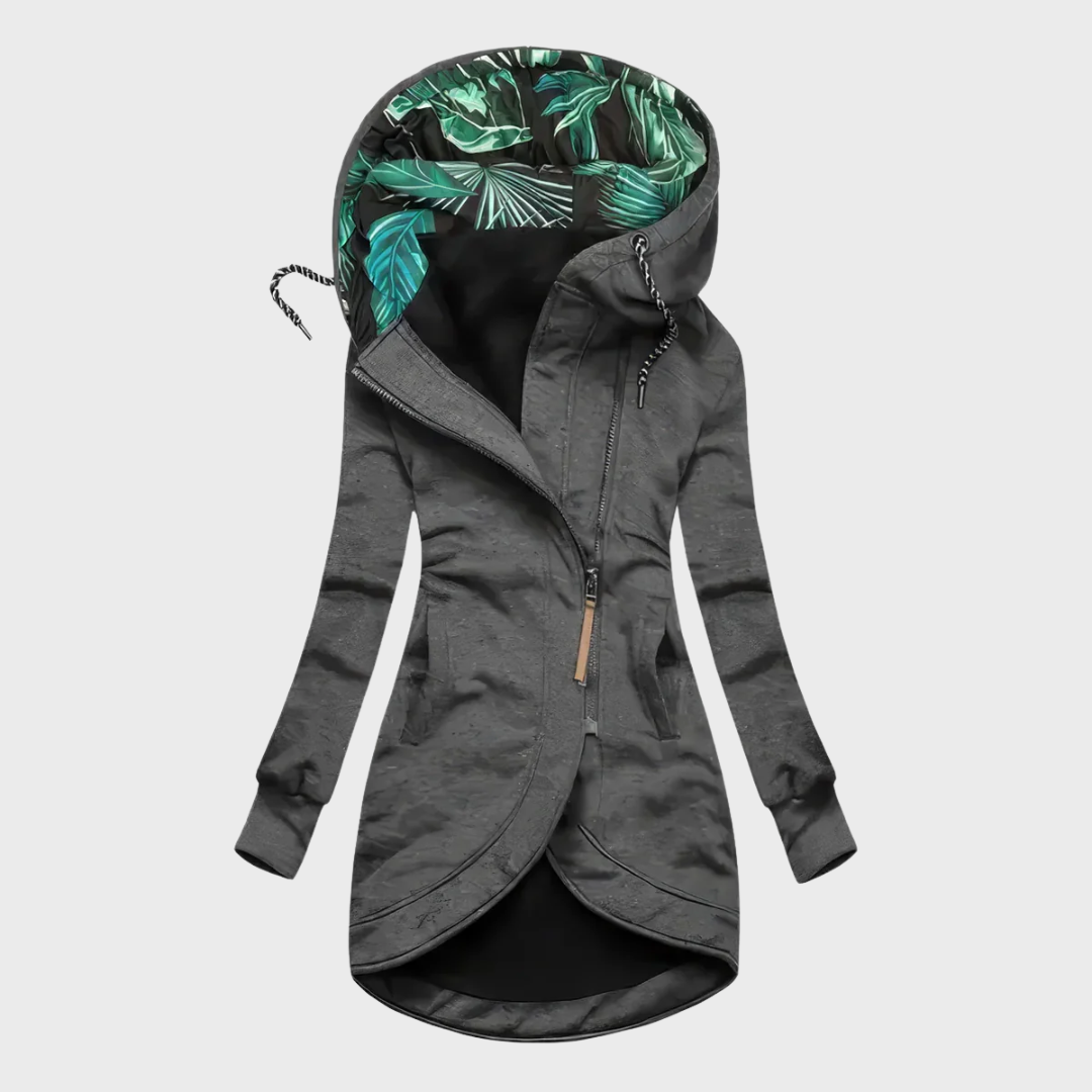 Dark gray winter parka with hood, full zipper, side pockets, and teal-pattern hood lining