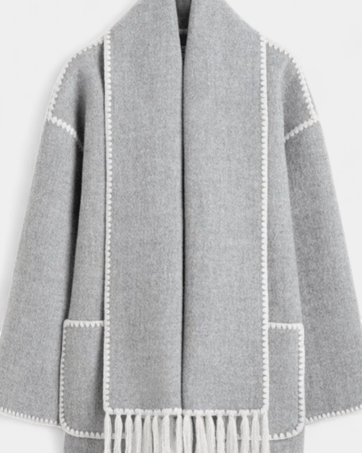 Light gray wool coat with integrated scarf, white contrast trim and patch pockets with fringe
