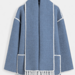 Women’s coat with integrated scarf, blue with white trim and fringe hem