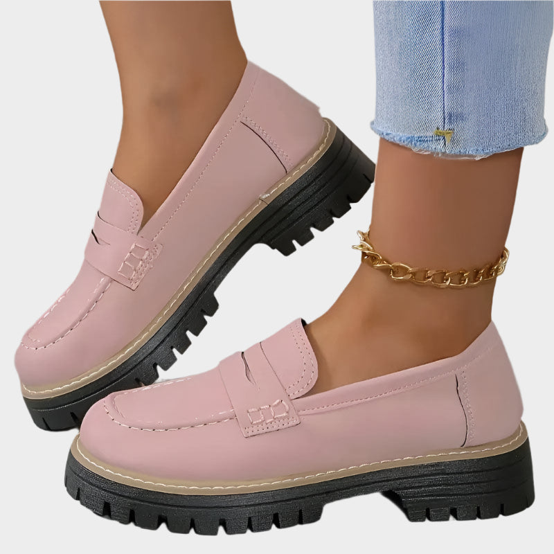 Pink chunky-sole loafer moccasin with strap detail and rugged tread sole