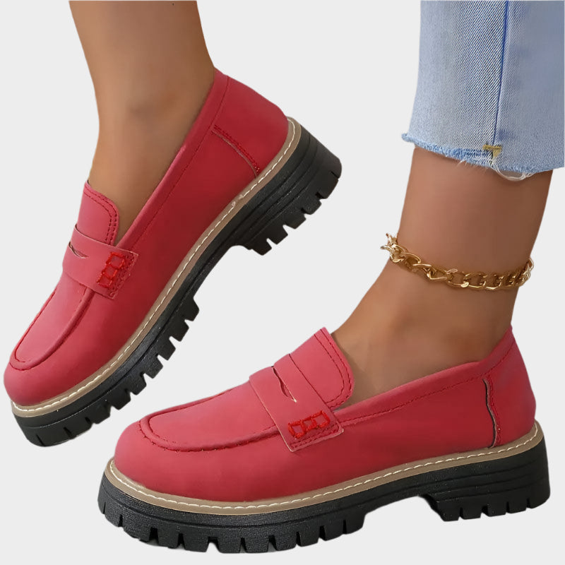 Red chunky-sole loafer moccasin with front strap and textured tread sole