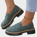 Teal chunky-sole loafer moccasin with front strap and contrast stitching
