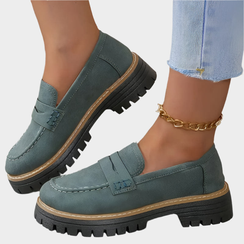 Teal chunky-sole loafer moccasin with front strap and contrast stitching