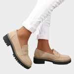Beige chunky-sole loafer moccasin with V-notch strap and stitched upper