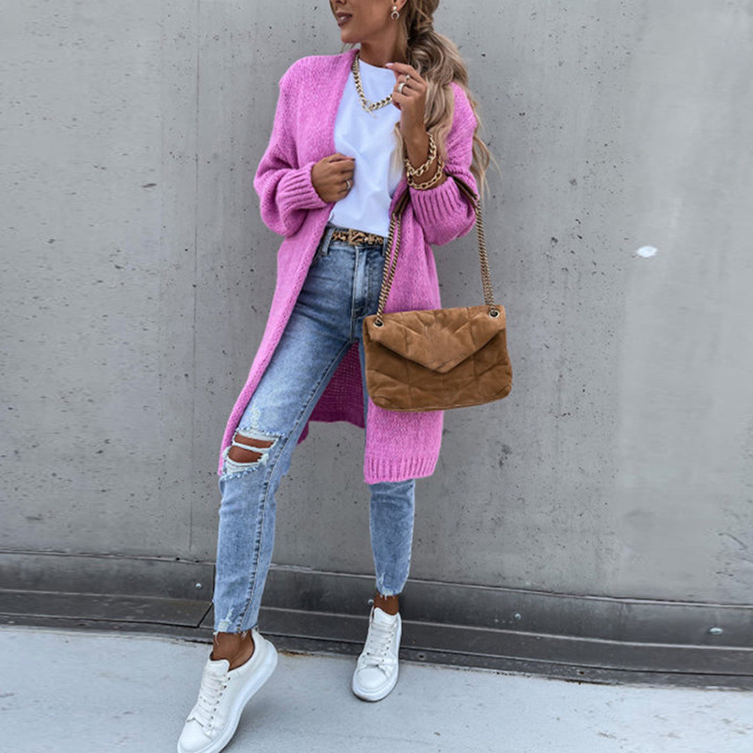Long knit cardigan in bright pink with open front and ribbed cuffs, side hem