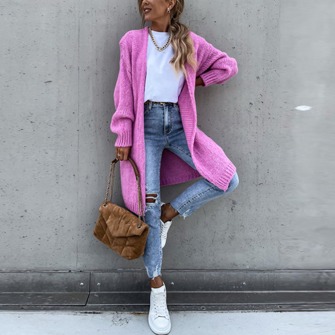 Long bright-pink knit cardigan with open front and ribbed hem and cuffs